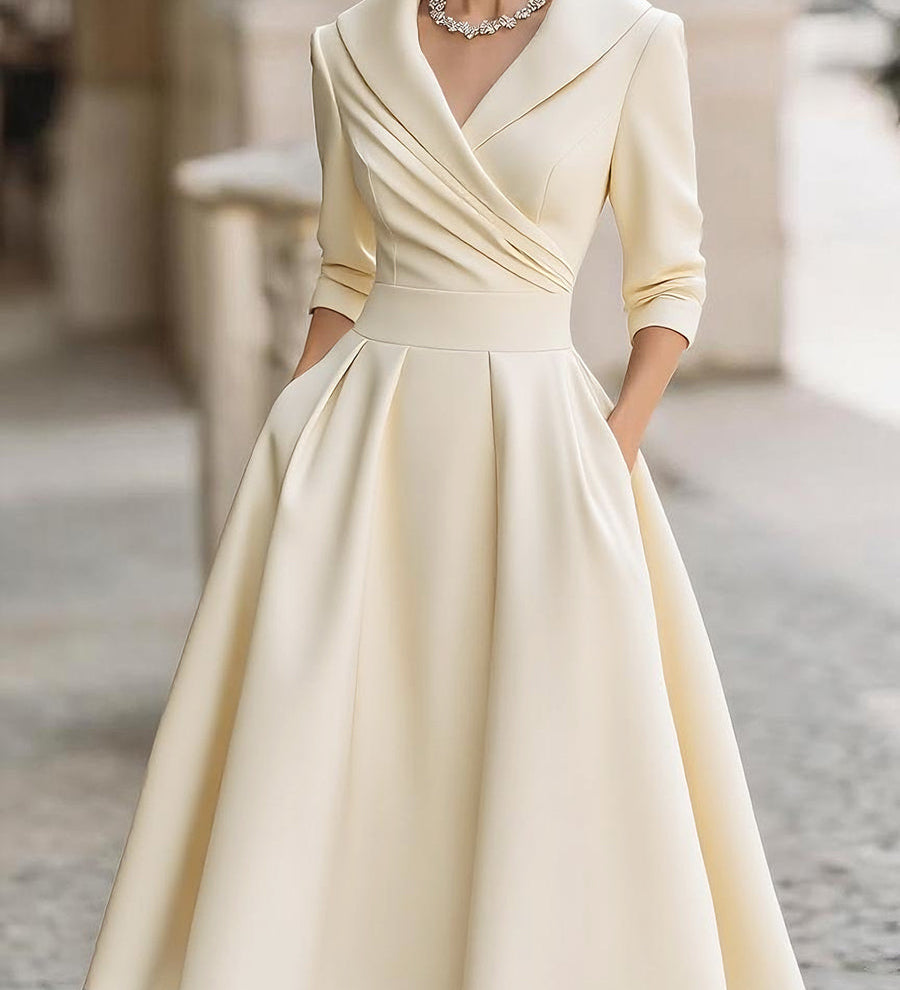 Lea™ - Elegantna midi obleka z diskretnim sijajem