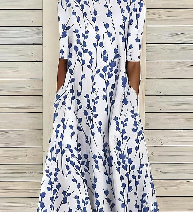 Sela™ – Poletna midi obleka z elegantnim cvetličnim potiskom